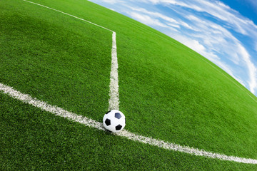 Fototapeta na wymiar soccer ball on green grass field