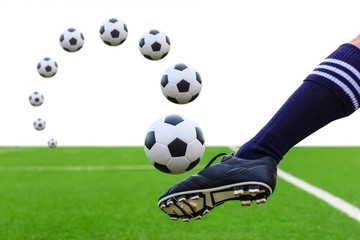 foot kicking soccer ball isolated