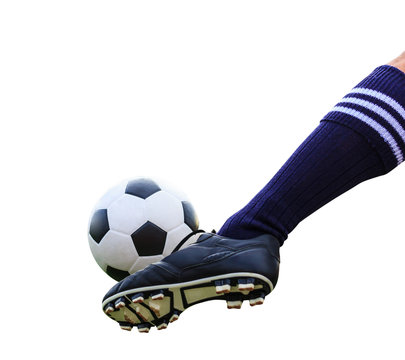 Fototapeta foot kicking soccer ball isolated with clipping path