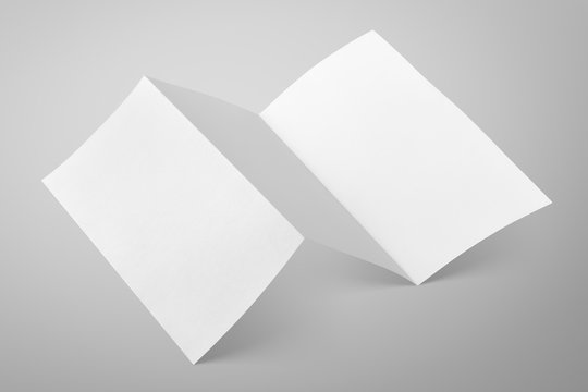 Empty fold flyer on gray with clipping path