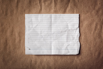 Ragged sheet of notebook