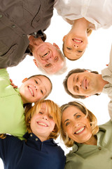 three generations family looking at camera isolated on white bac