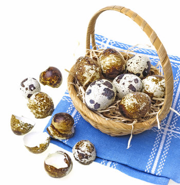 fresh quail eggs in a basket