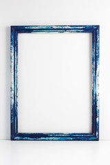 Blue grunge wooden picture frame