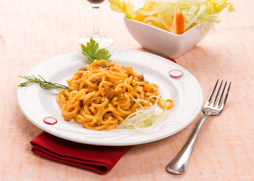 Gramigna con salsiccia, fuoco selettivo