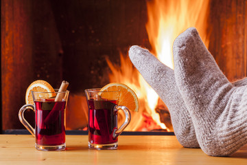 relaxing at the fireplace on winter evening