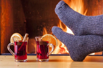 relaxing at the fireplace on winter evening