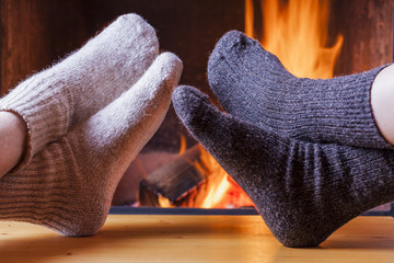 relaxing at the fireplace on winter evening
