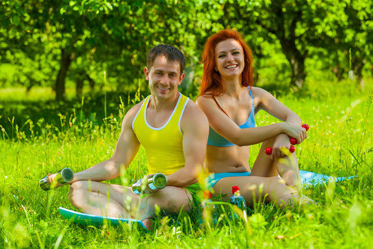 a fitness couple - Powered by Adobe