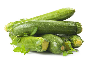 Fresh zucchini close up on the white