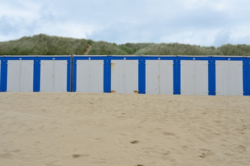 Beach cabines in the sand Holland
