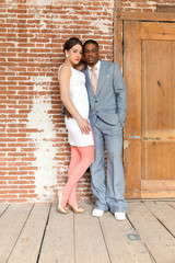 Vintage fashion romantic wedding couple in old urban building. M