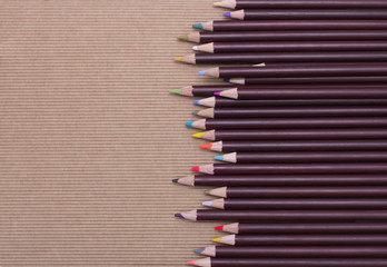 Colored pencils on cardboard