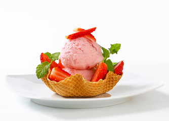 Pink ice cream in waffle basket