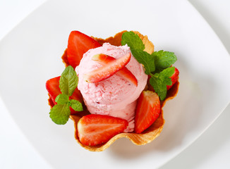 Pink ice cream in waffle basket