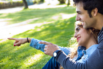 outdoor portrait of young couple at the park