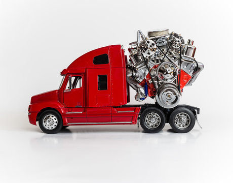 die cast model truck carying model engine