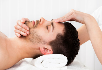 Man getting spa treatment
