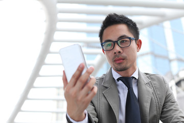 Businessman holding digital tablet
