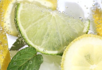 Detail of jug with fresh fruit lemonade.