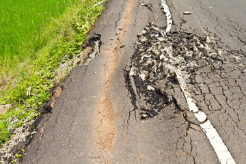 Surface asphalt pathway on the side street were demolished