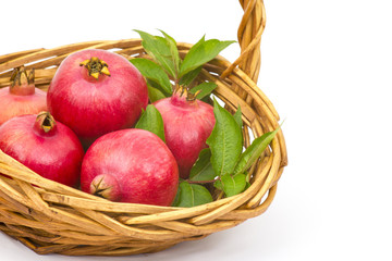 fresh pomegranates in a basket