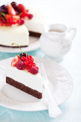 Vanilla and chocolate cheesecake with berries, selective focus