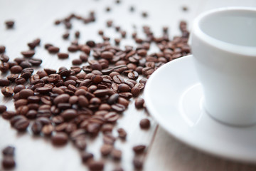 cup of coffee with coffee beans