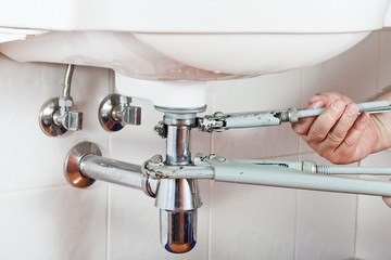 repairing sink drain
