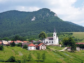 Church and hill in ValaskÃ¡ DubovÃ¡