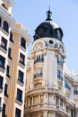 Fototapeta premium Old ornamental building at Gran Via in Madrid, Spain