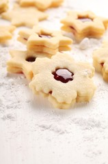 Close-up of shortbread cookies on white wooden background.