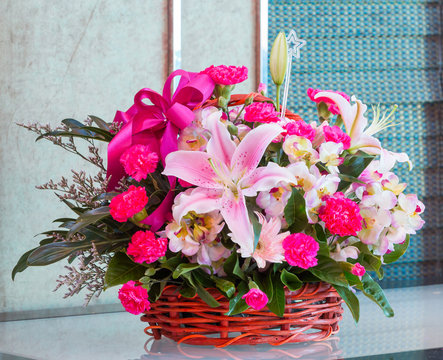 Bouquet of flower in wicker basket