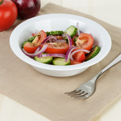 served plate with mix salad from tomatoes and cucumbers