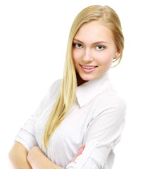 A beautiful woman standing with her arms crossed