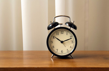 Analog Alarm Clock on Desk