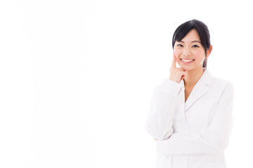 attractive asian doctor thinking on white background