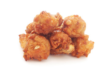 fried chicken drumsticks on white background