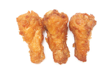 fried chicken drumsticks on white background