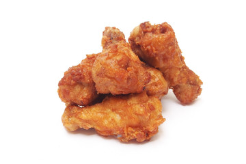 fried chicken drumsticks on white background