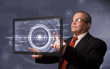 Businessman touching modern technology tablet
