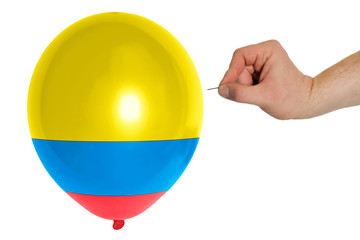 Bursting balloon colored in  national flag of columbia