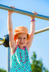 Girl and jungle gym