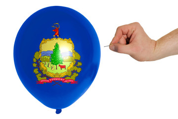 Obraz premium Bursting balloon colored in flag of american state of vermont