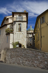 Fototapeta na wymiar Old town alley in Assisi Tuscany Italy