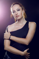 Naklejka premium Beautiful girl brutal, with long reddish tail in a black t-shirt