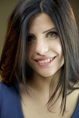 Naklejka premium Portrait of happy female model with green eyes