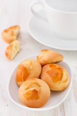 cookies on the plate with cup