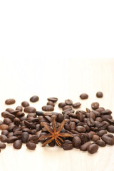 Coffee and star anise on white