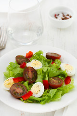 salad with eggs and tomato on the plate